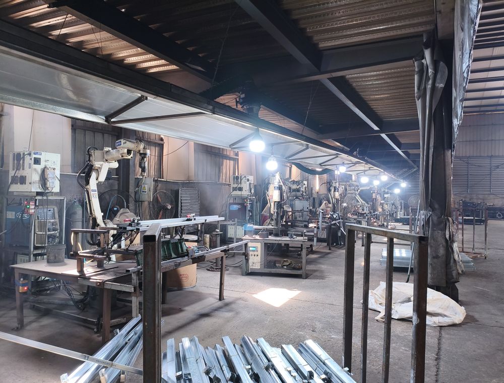 Ground screw forming and threading line